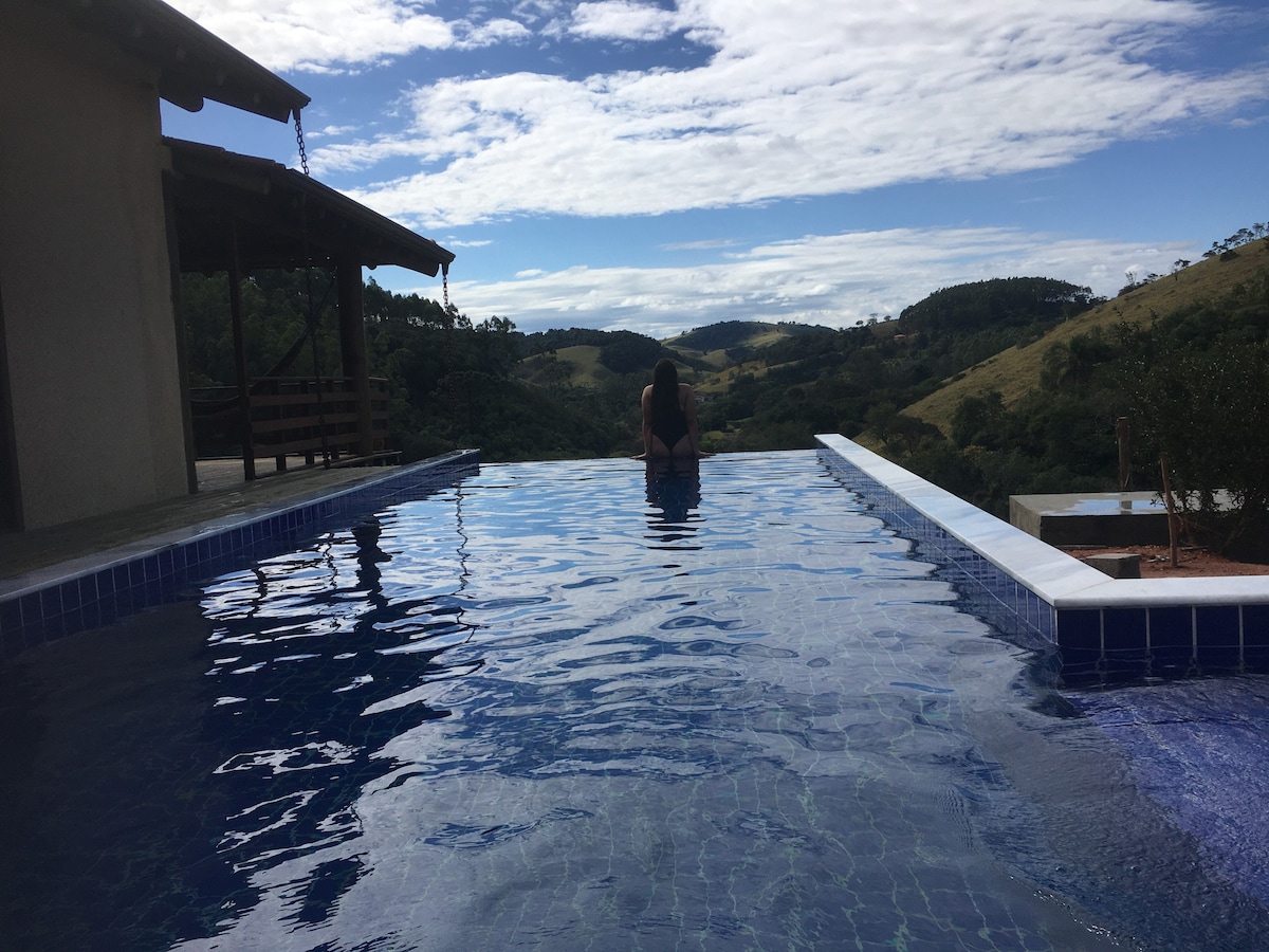 casarão com piscina, hidro e cachoeira