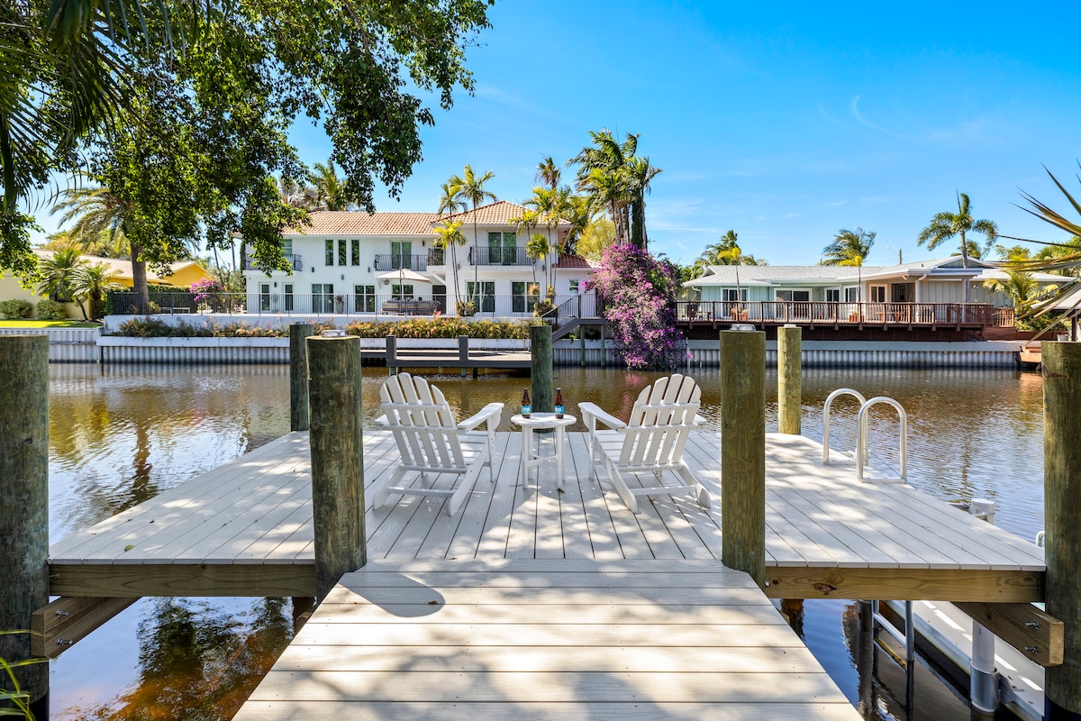 Canal-side home with dock, heated pool & canoe