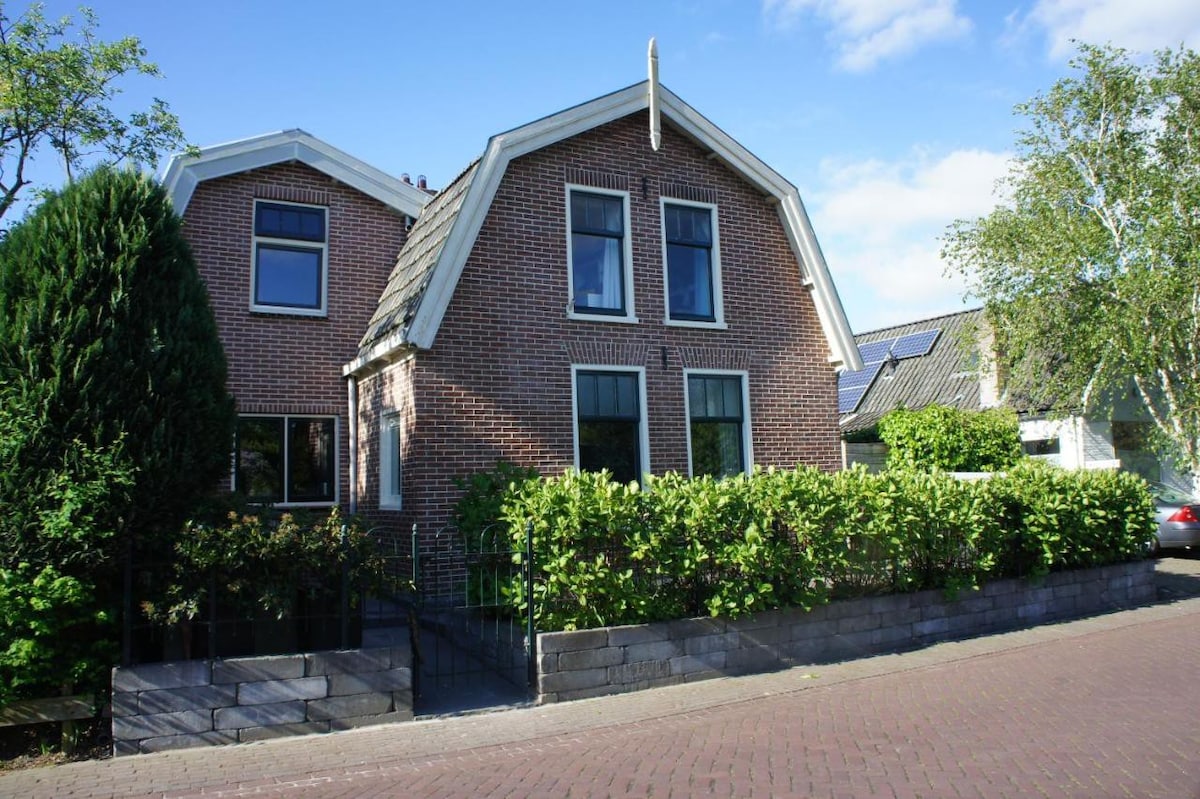 Typical Dutch house near city and beach