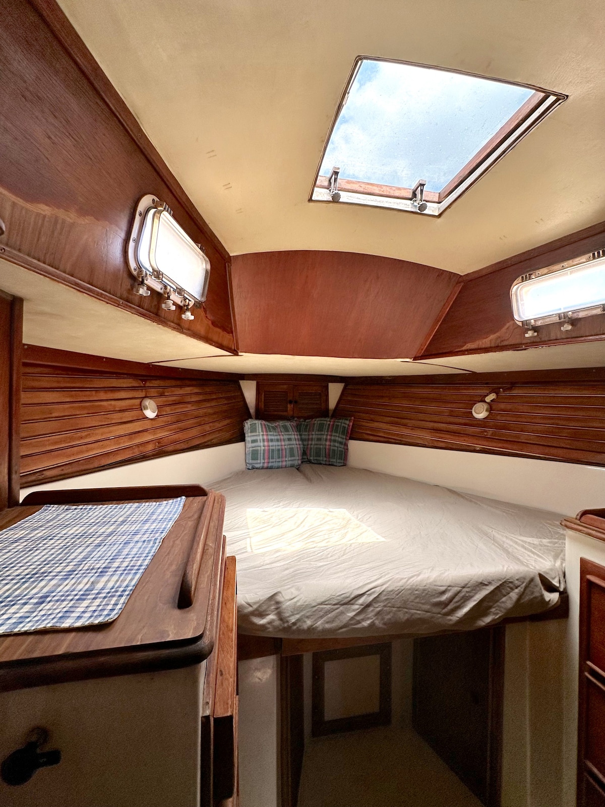 Private cabin on a sailboat in a marina