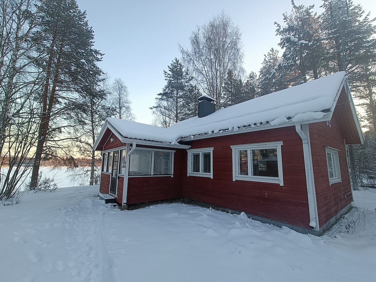 Lappish cottage by the River