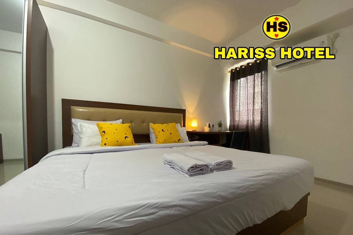 Cozy Standard Room @ Hariss Inn Bandara