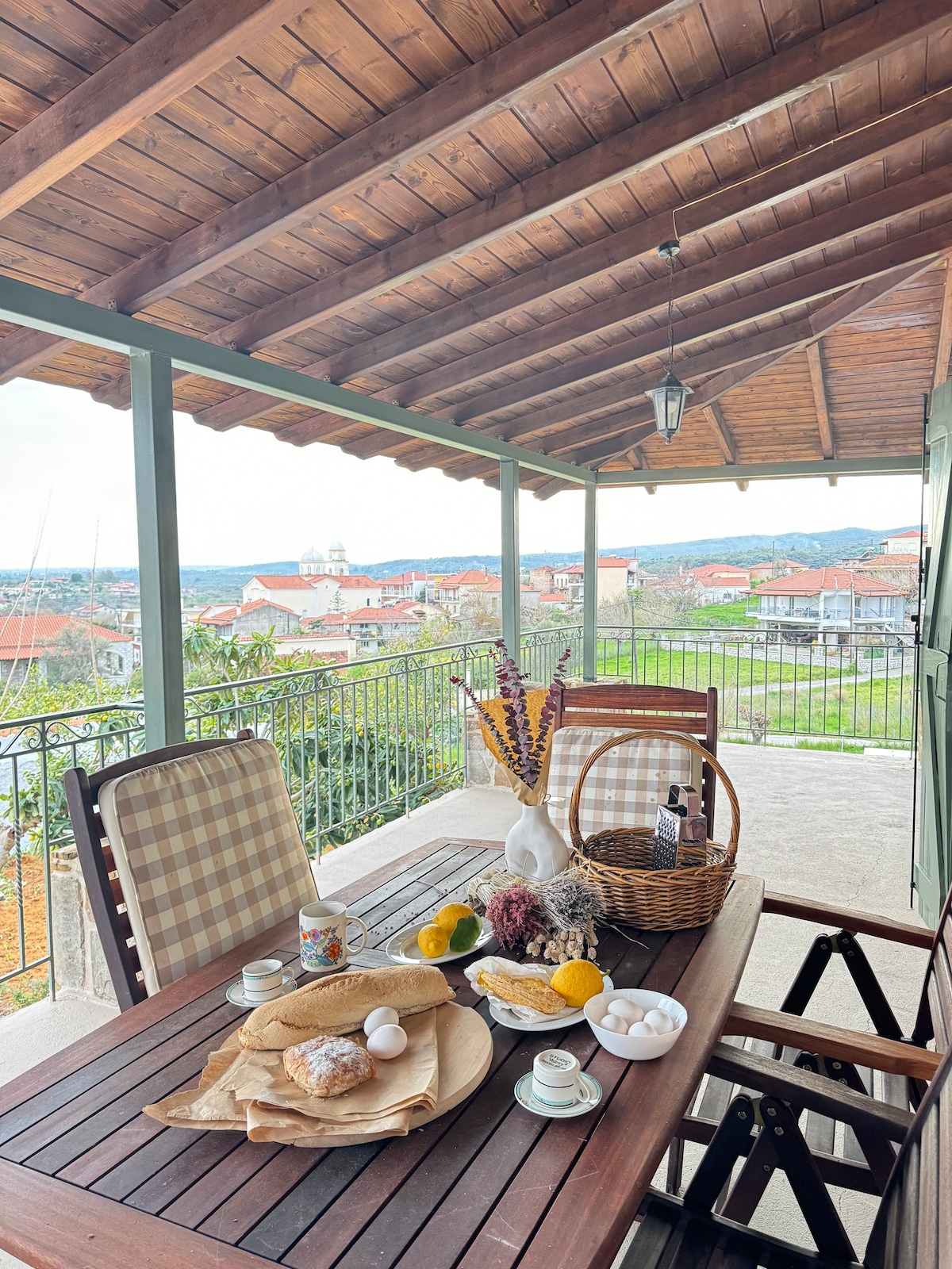 Traditional two-story stone house with view