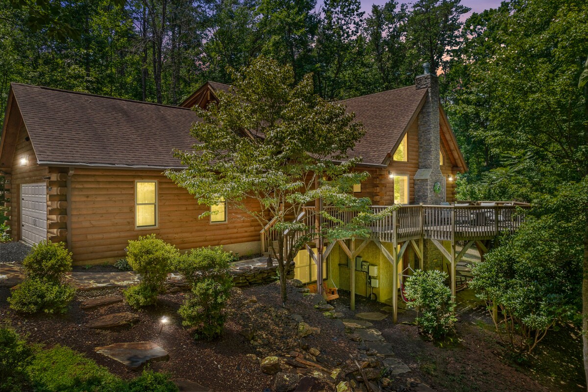 Cozy, modern log cabin nestled in the mountains.