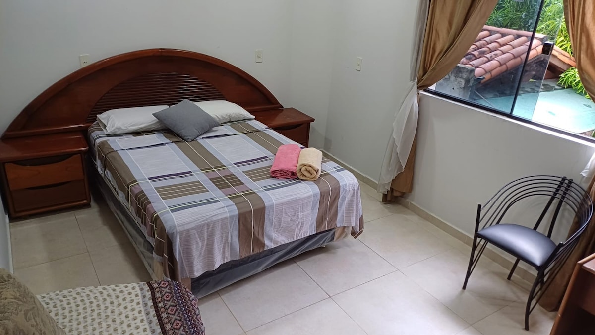 Main room near Ñu Guazu Park (w/ private bathroom)