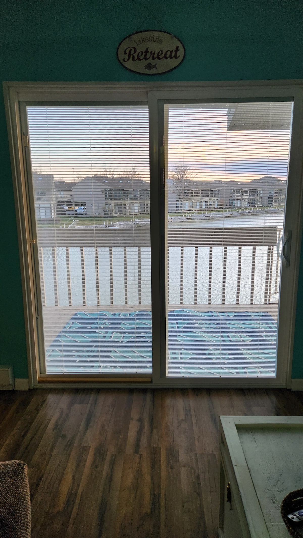 Gorgeous waterfront balcony view with a boat dock