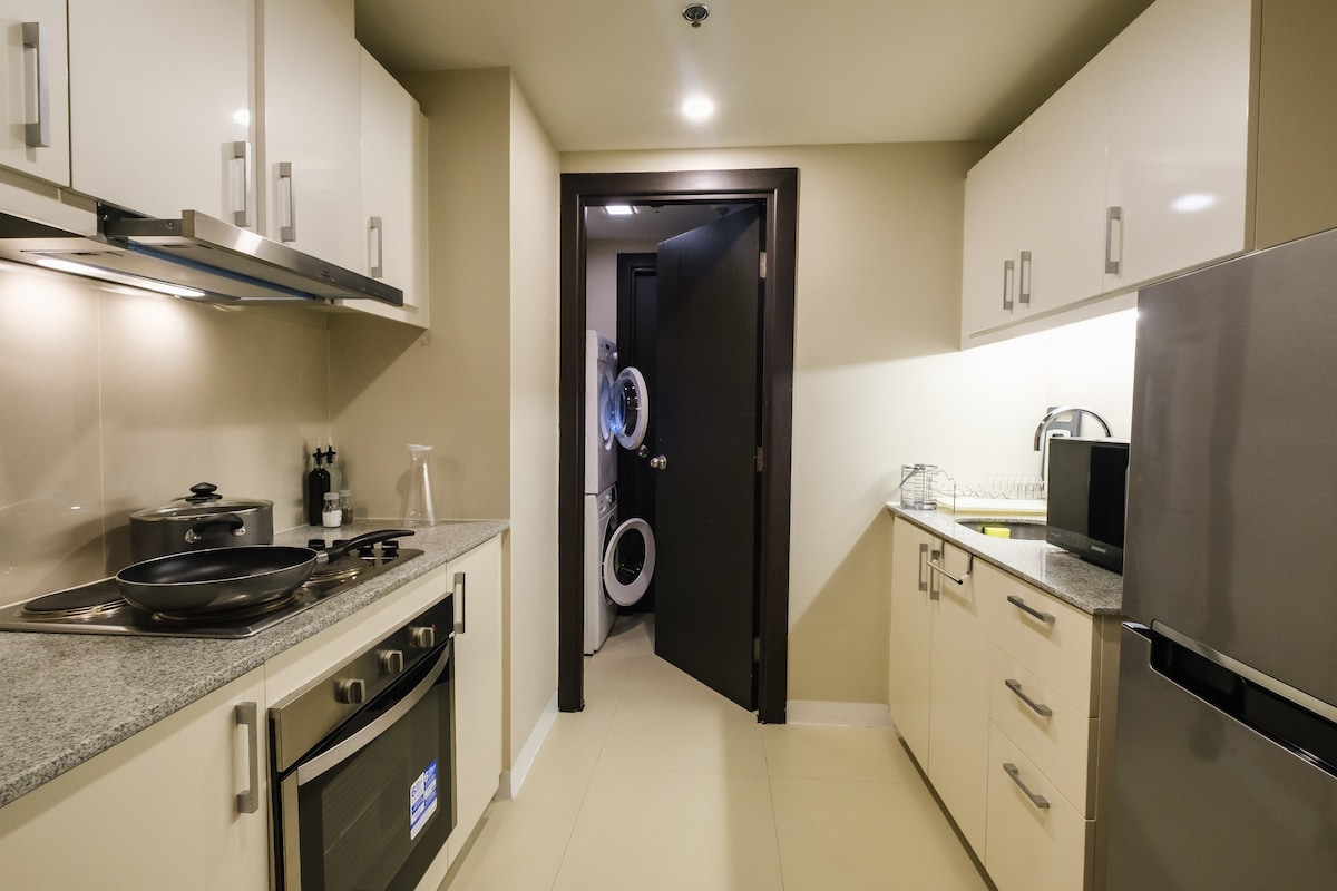 UpSTYLE: 2BR Apartment in BGC | Workspace + Pool