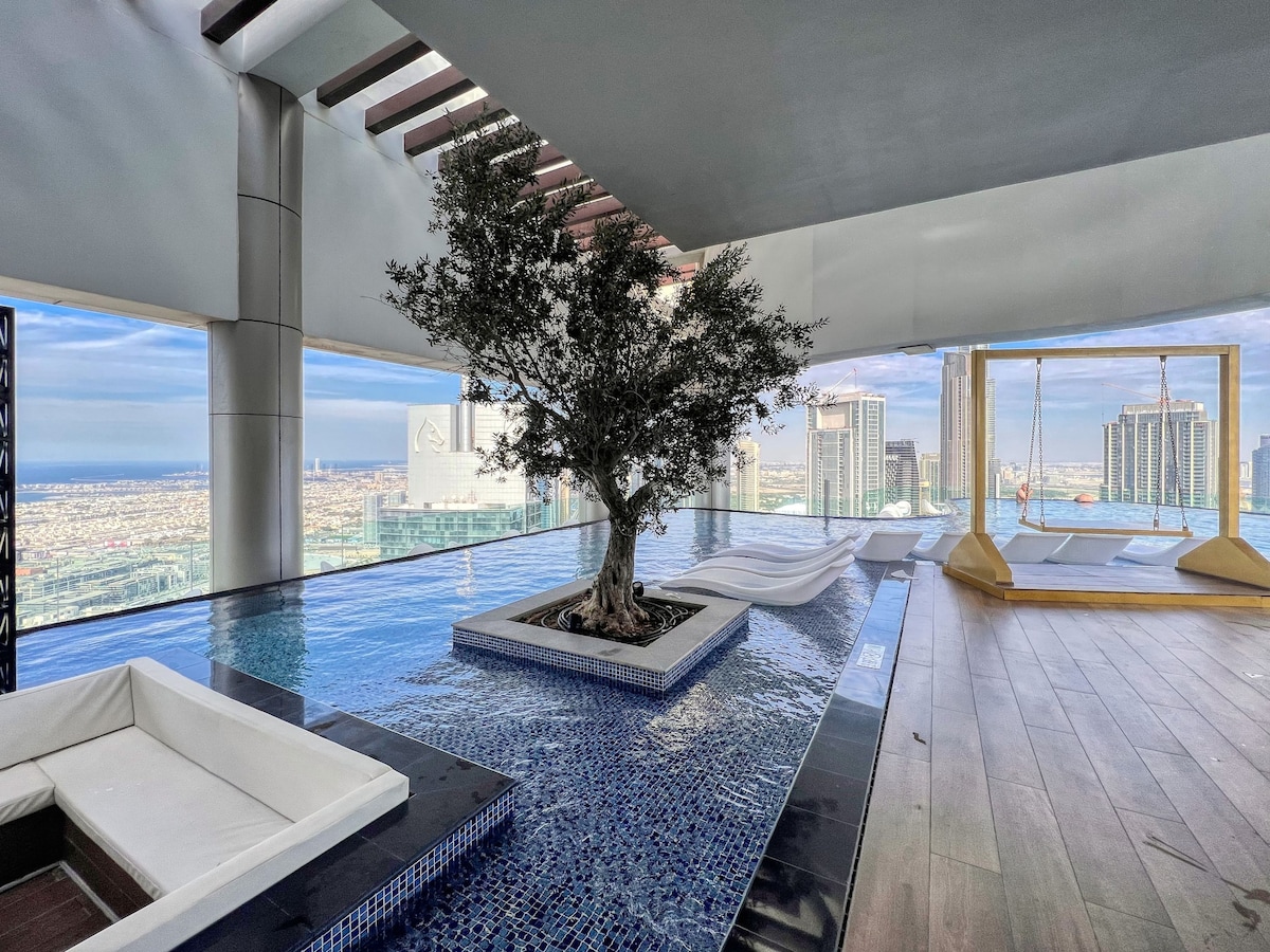 Sky-High Infinity Pool With Burj Khalifa Views