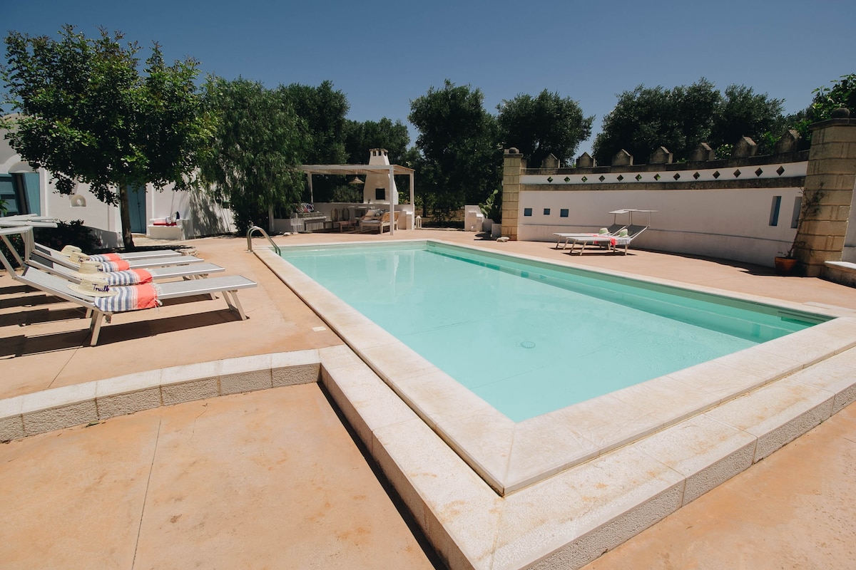 Traditional trullo with swimming pool