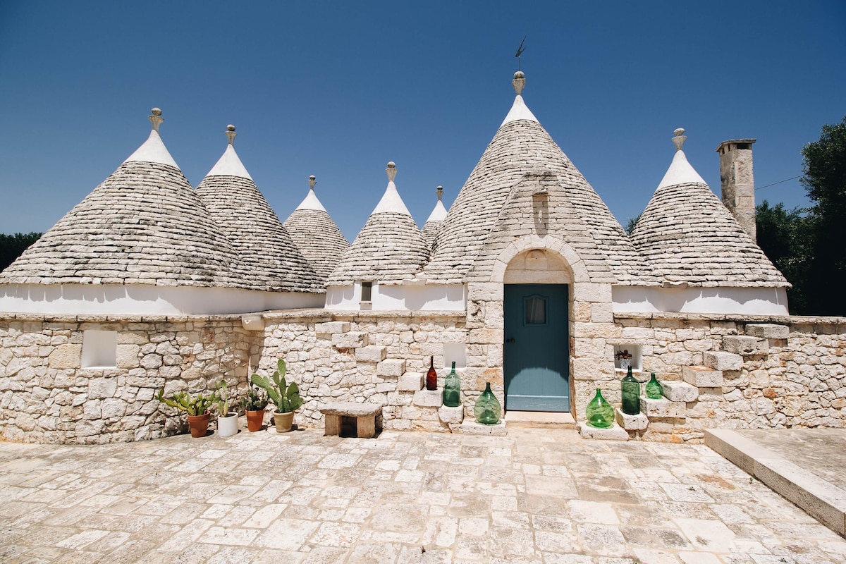 Traditional trullo with swimming pool