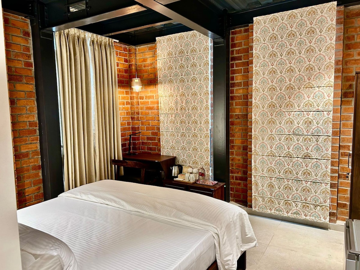 Brick-walled Beauty: Chalukya Suite Room