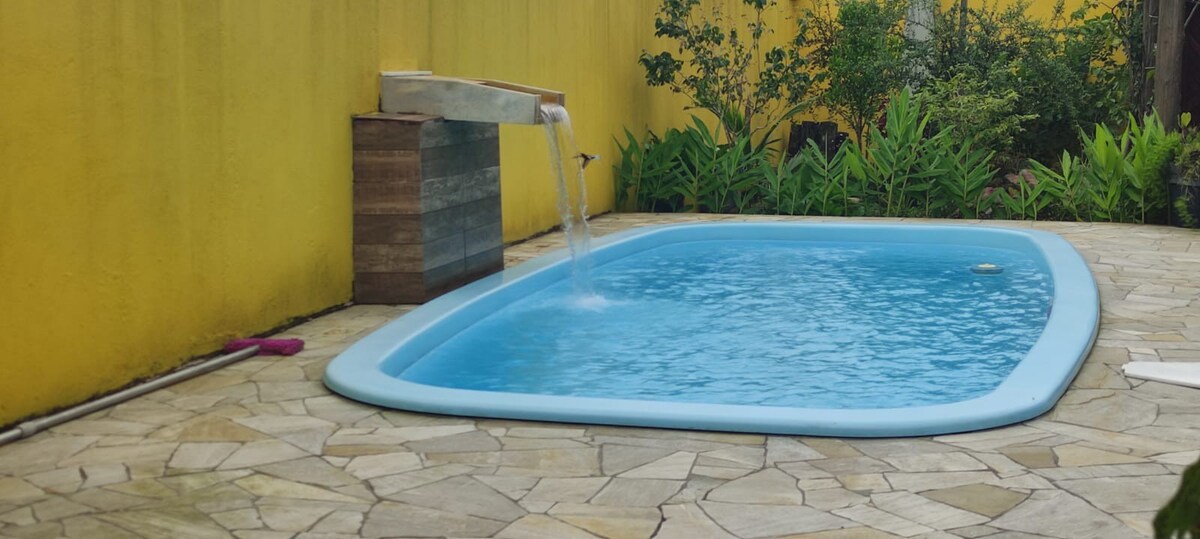 Casa com piscina em Peruíbe/SP.