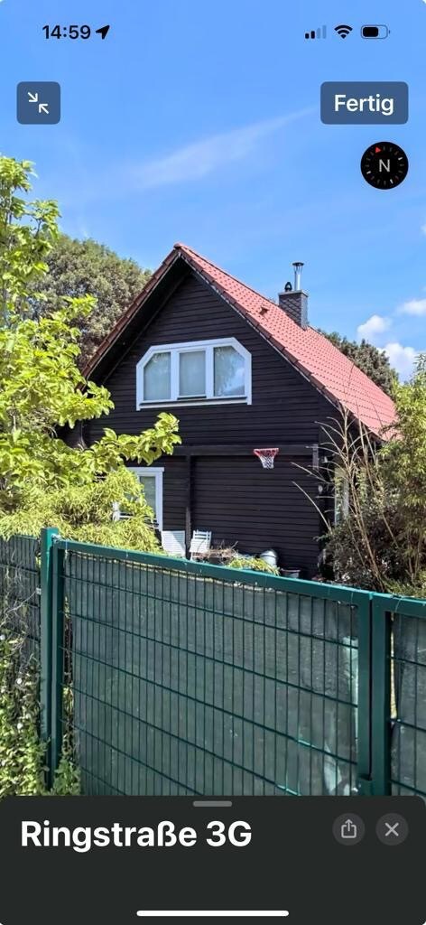 Holzhaus mit Seeblick