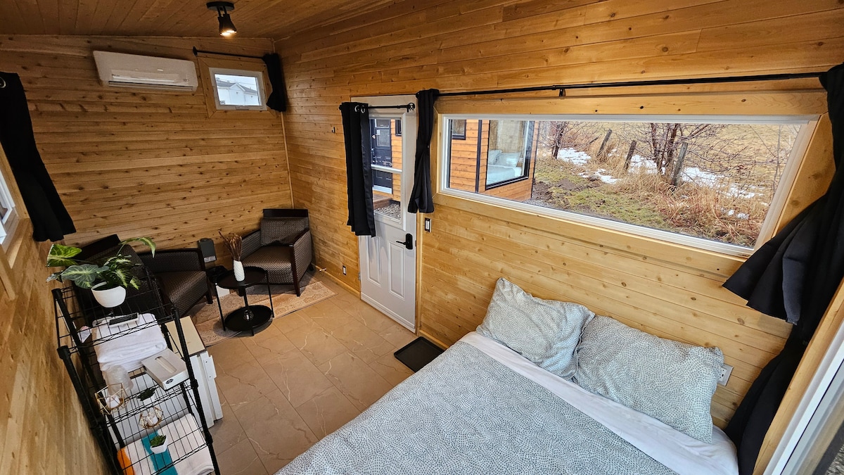 Mobile home with double bed - view over the valley