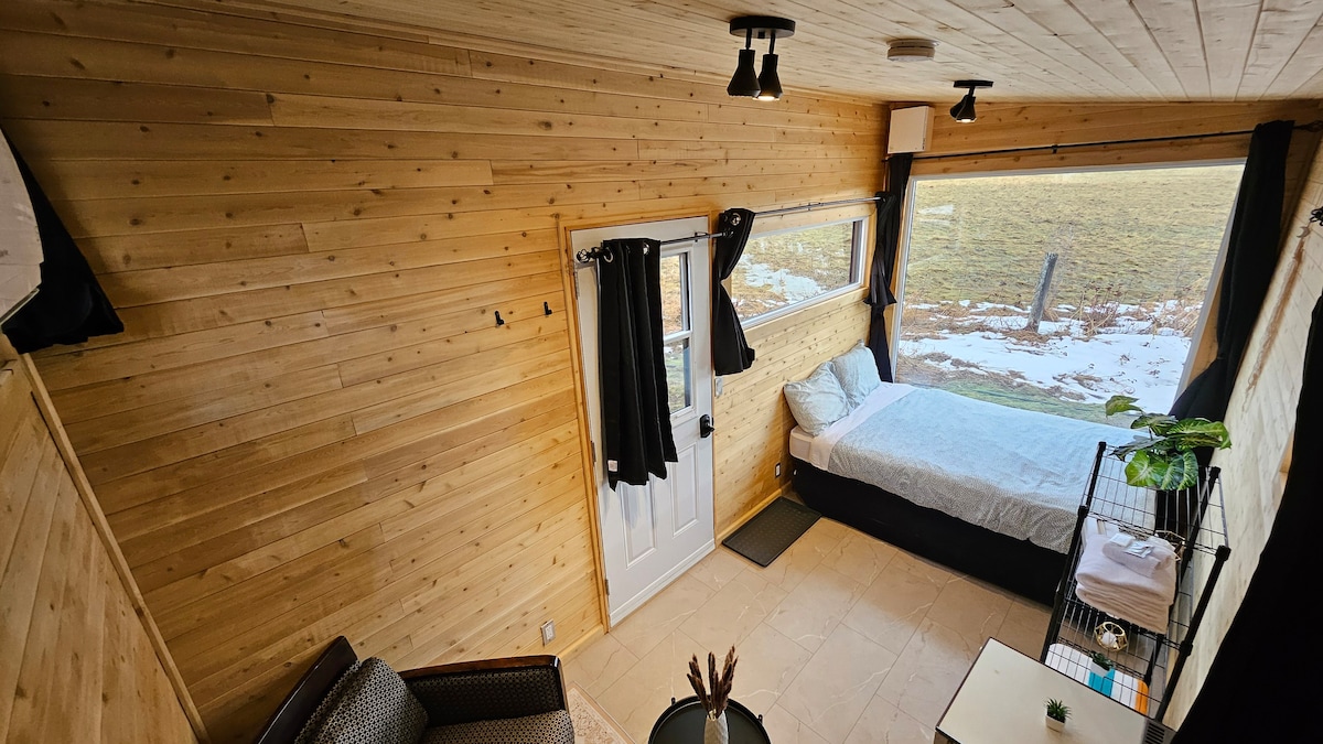 Mobile home with double bed - view over the valley