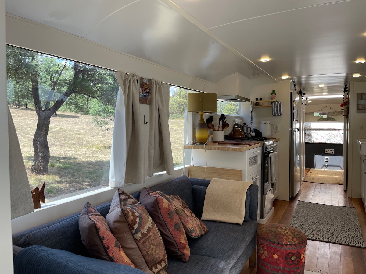 BUS Tiny Home 1980s classic with off grid elegance