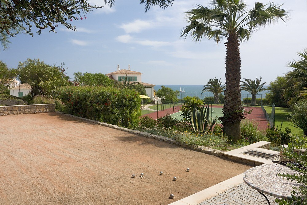 Luxury beachfront villa with cook and tennis court