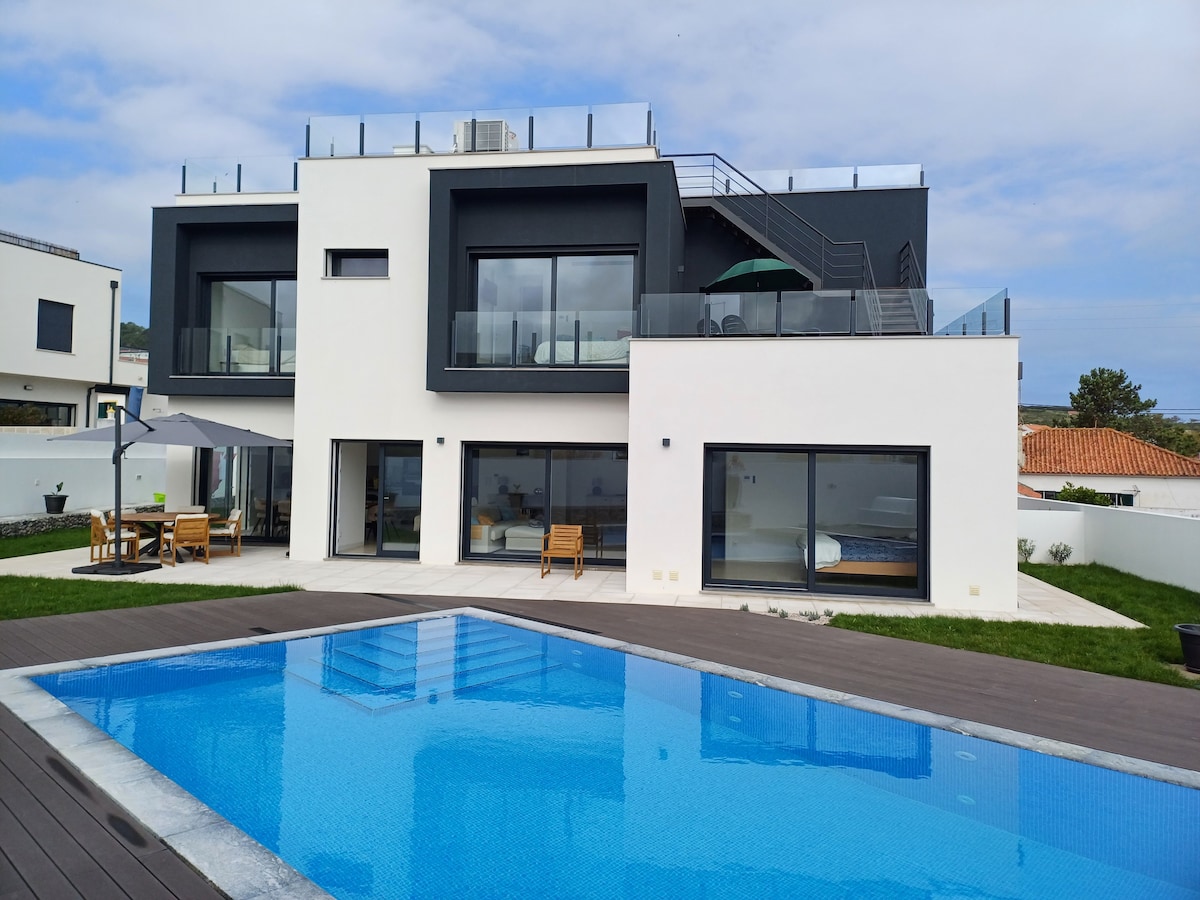 Stunning new villa with heated pool and garden