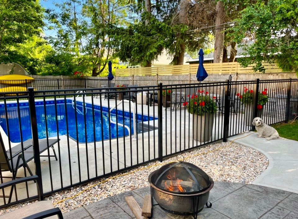 In town-Walk to Track, Private Backyard with Pool!
