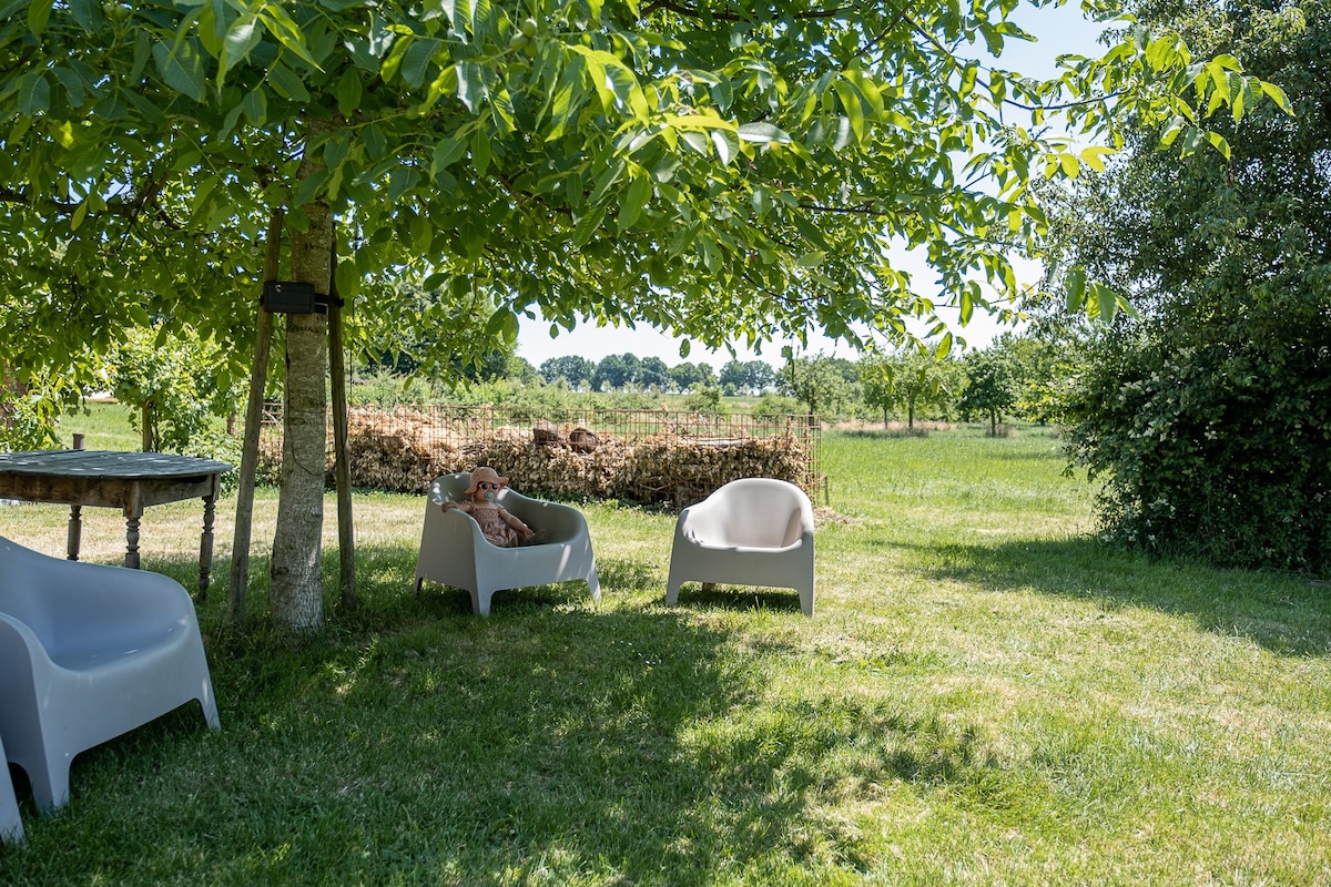 Vrijstaand vakantiehuisje op carré boerderij