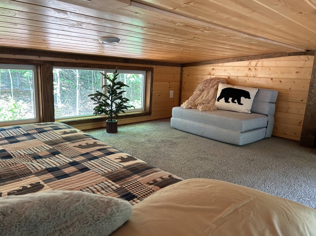 Get away, unwind and Snuggle Inn the Pines.