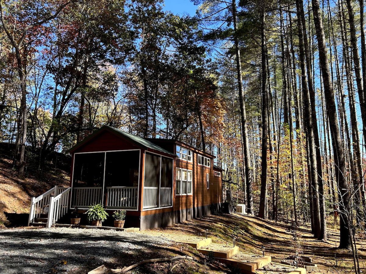 Get away, unwind and Snuggle Inn the Pines.