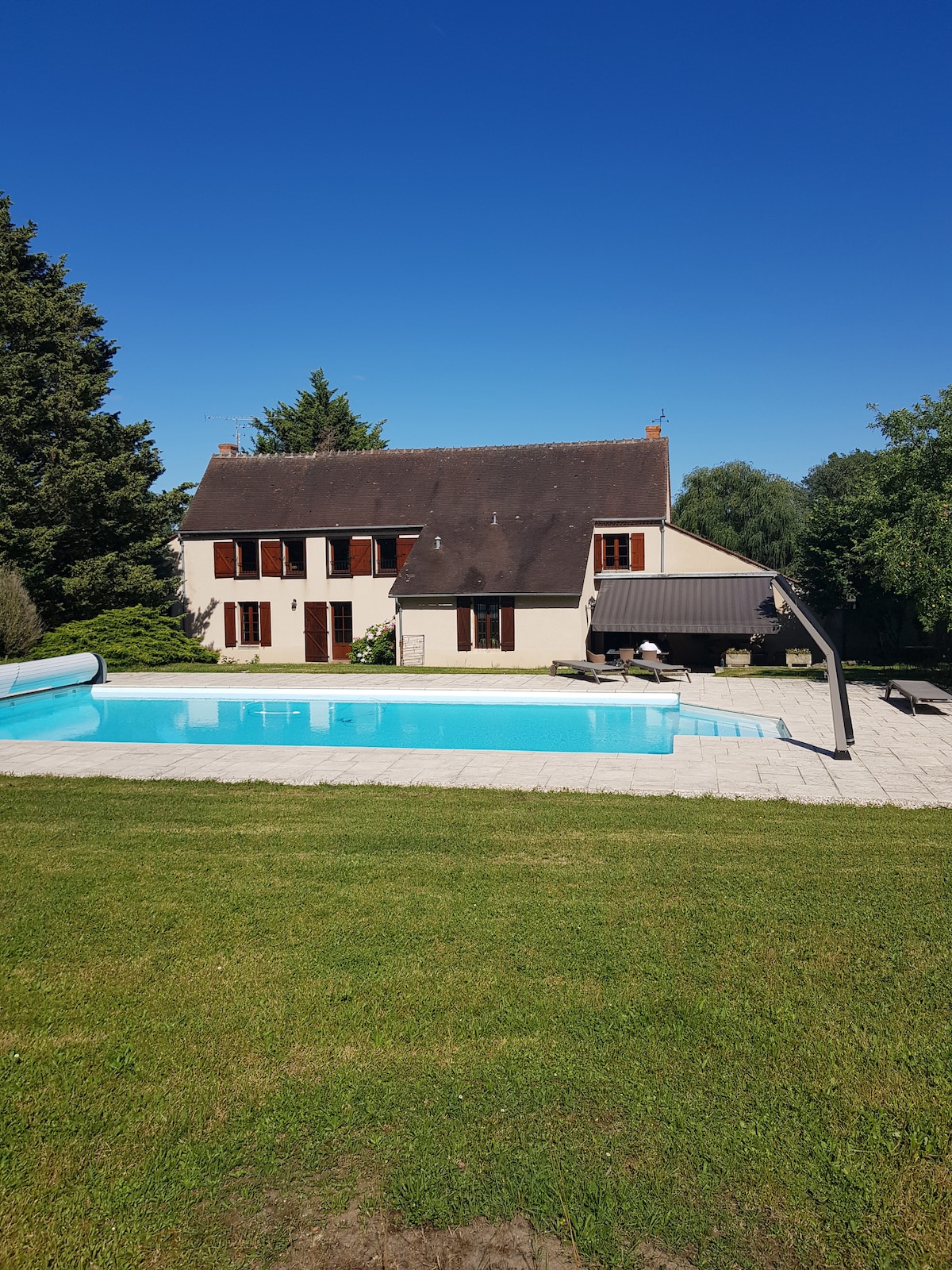 Maison avec piscine sur un golf