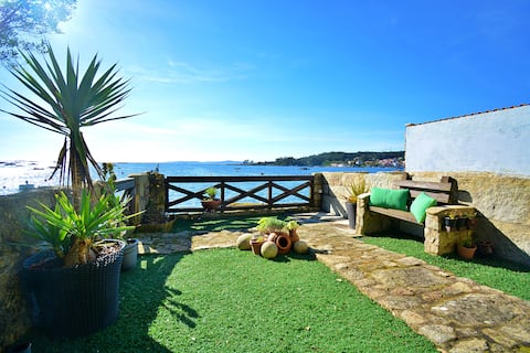 Casa bañada por el mar en A Illa de Arousa