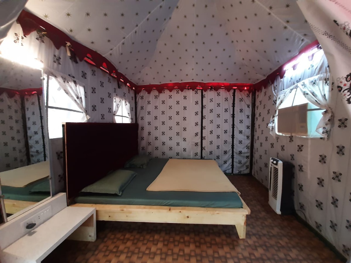 Tent with double bed.