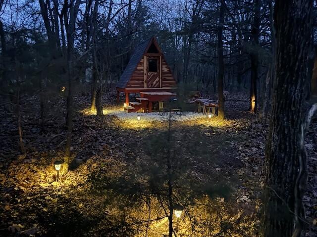 Tiny hut in the woods