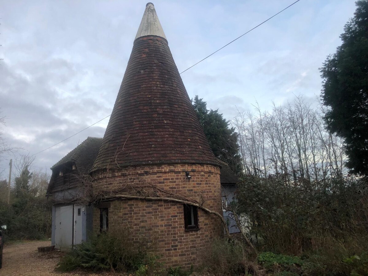 Oast House in an  orchard on the Greensands Way