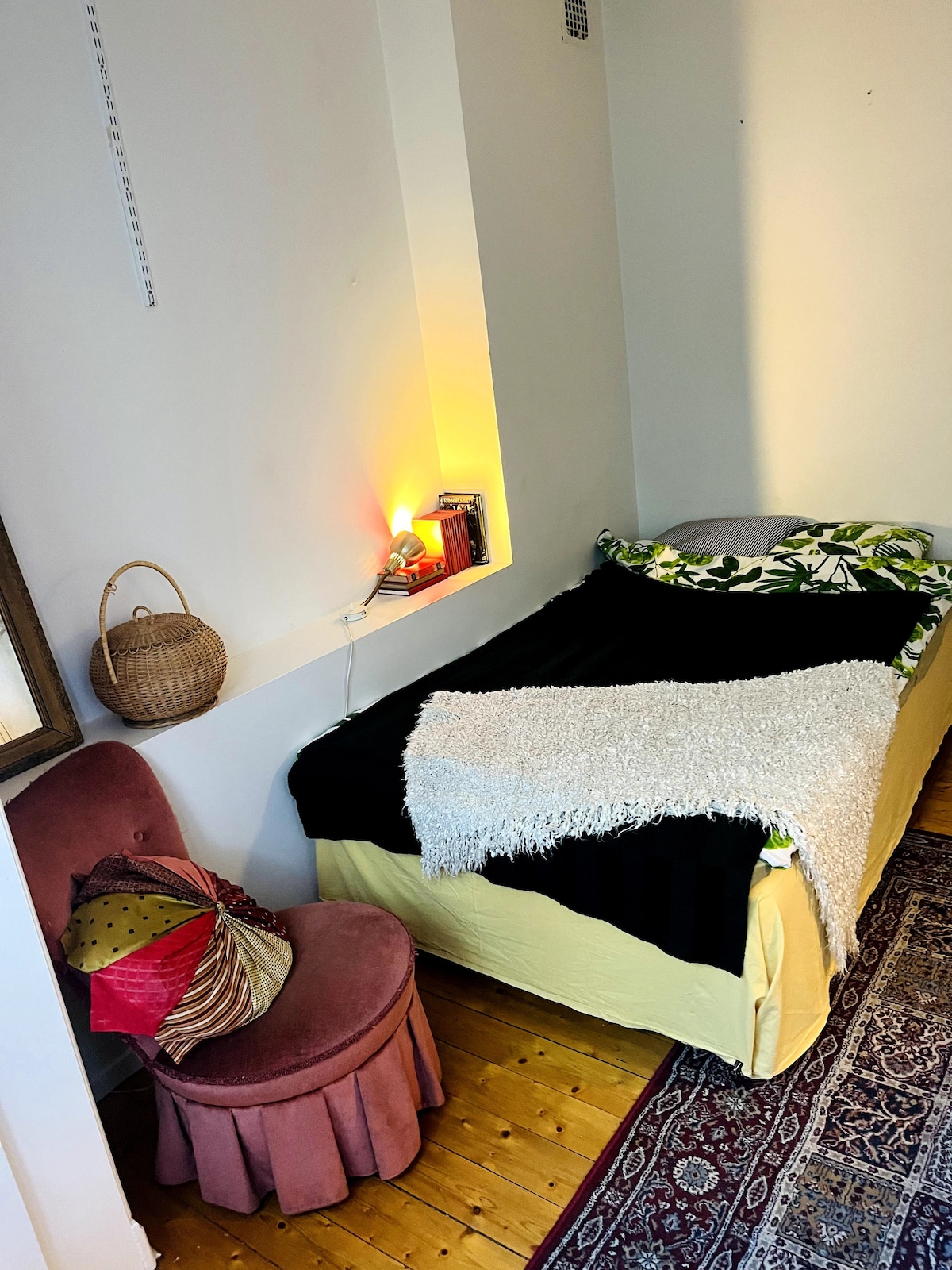 Calm room in artistic apartment in vibrant area