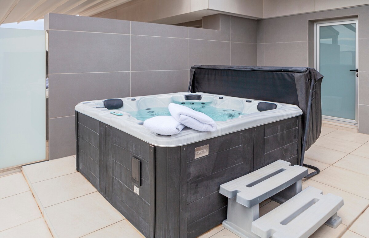 Penthouse with solarium and whirlpool bathtub.