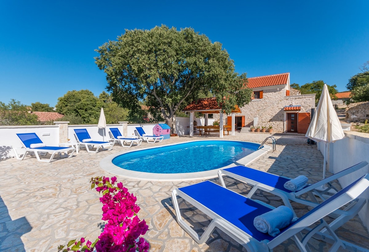 The Grandfather's courtyard villa with heated pool