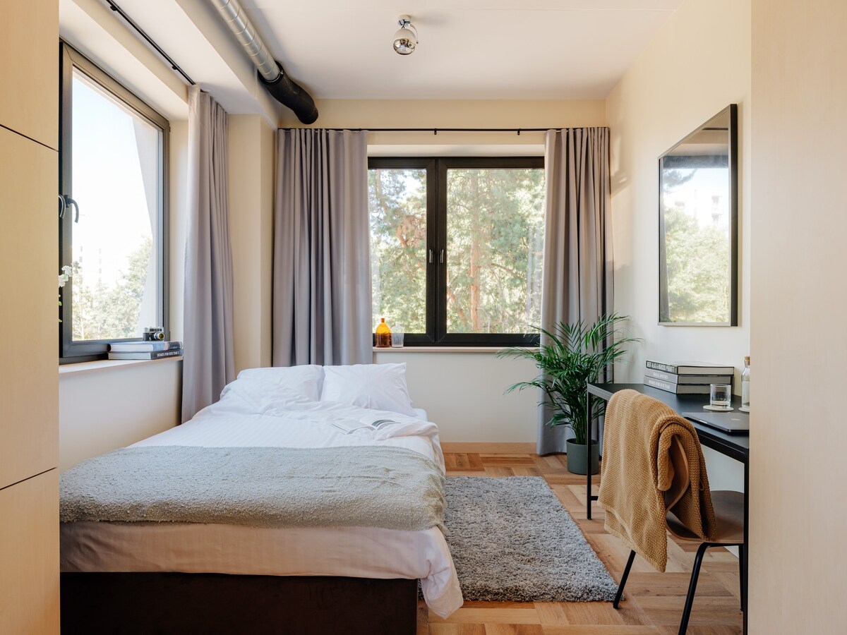 Cozy flat surrounded by pines