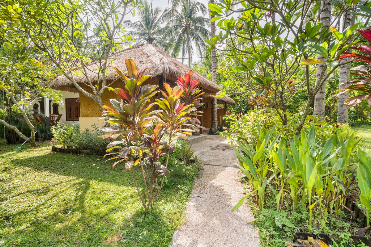 Private Bungalow in Tropical Garden 200m to beach.