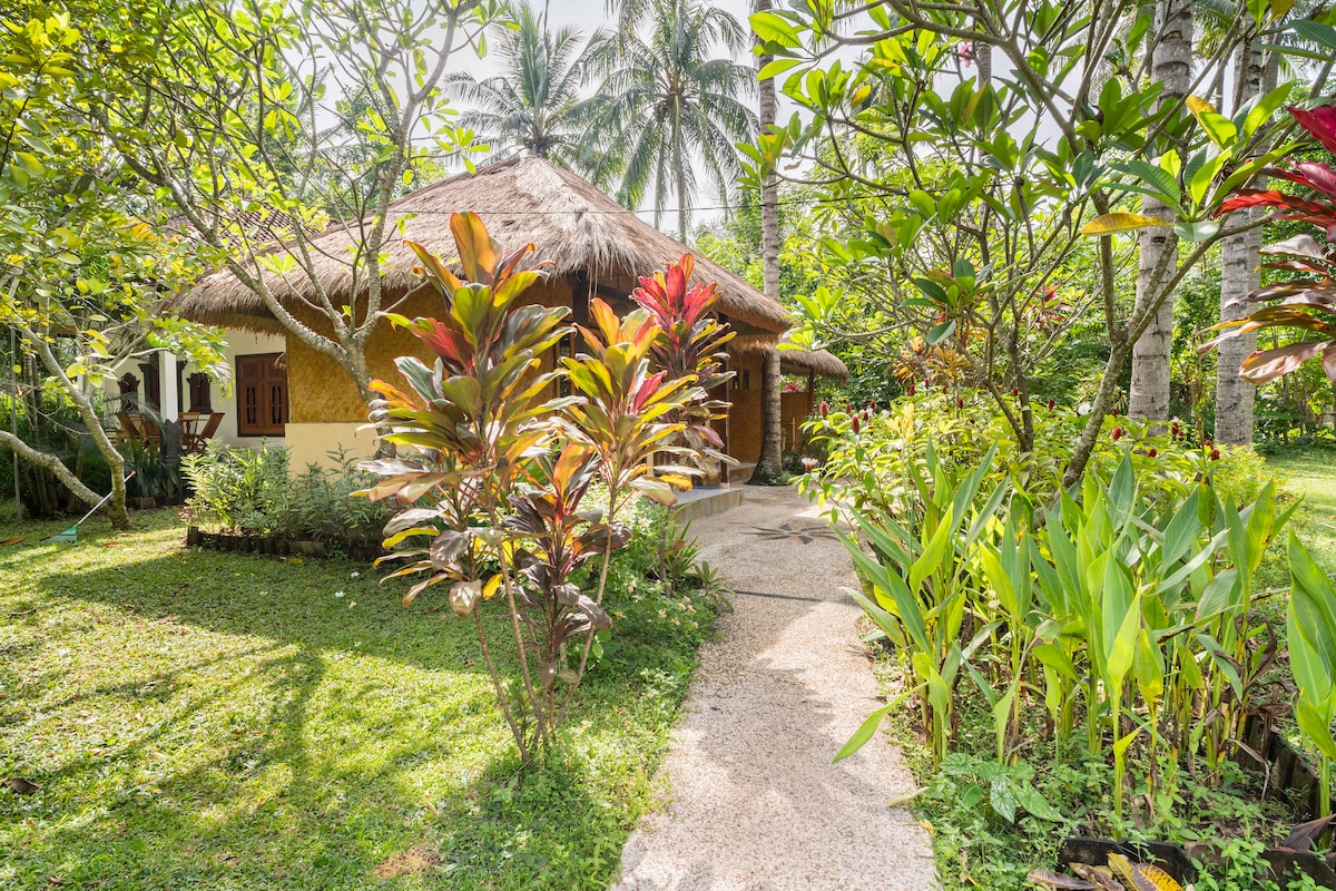 Private Bungalow in Tropical Garden 200m to beach.