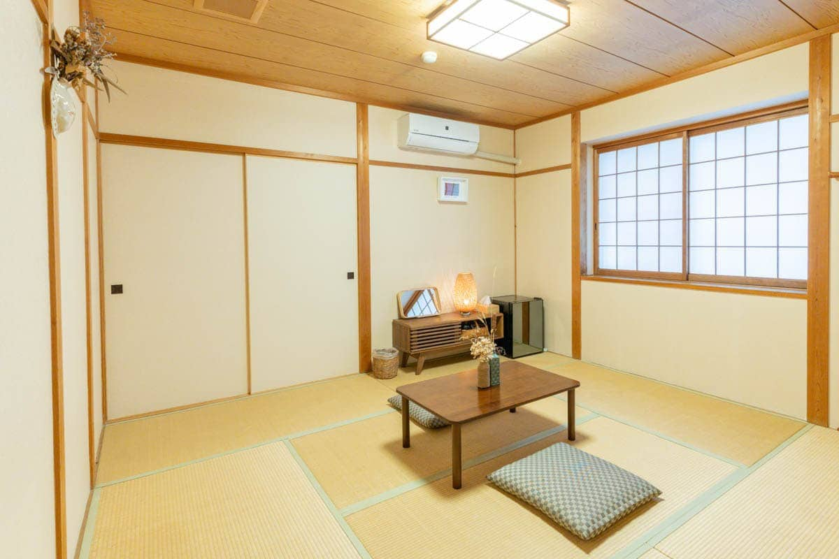 Hidden tatami room near forest and lake.