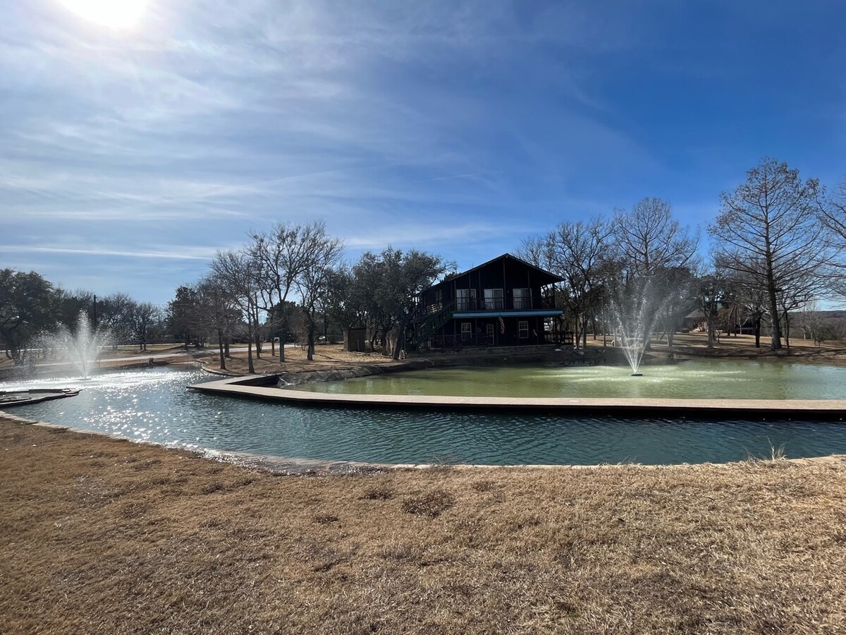 Log Cabin on a Duck Pond.