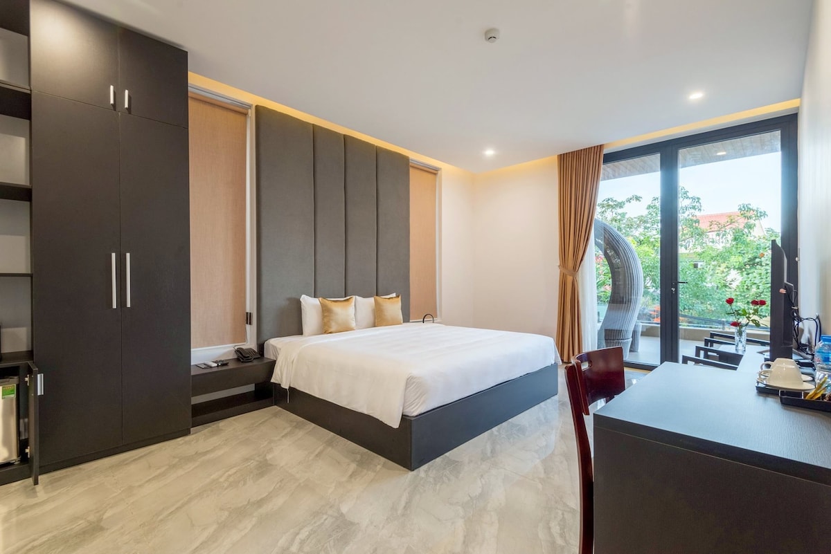 Modern room balcony with bathtub close to old town