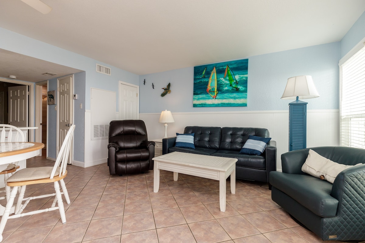 Dog friendly, beachfront condo with the best seat on the island!