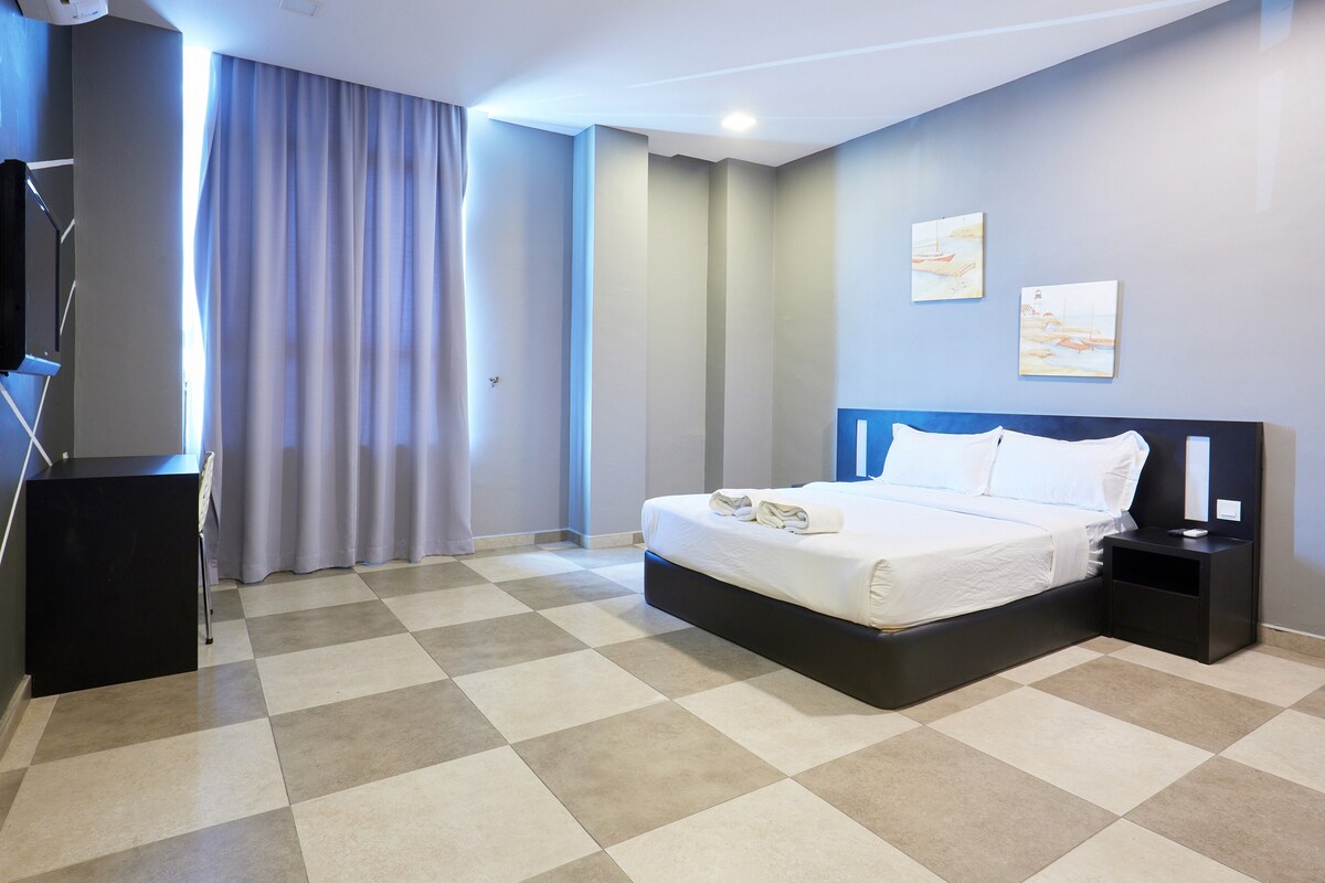 精英酒店（ Elite Hotel ）的舒适客房，标准双人床