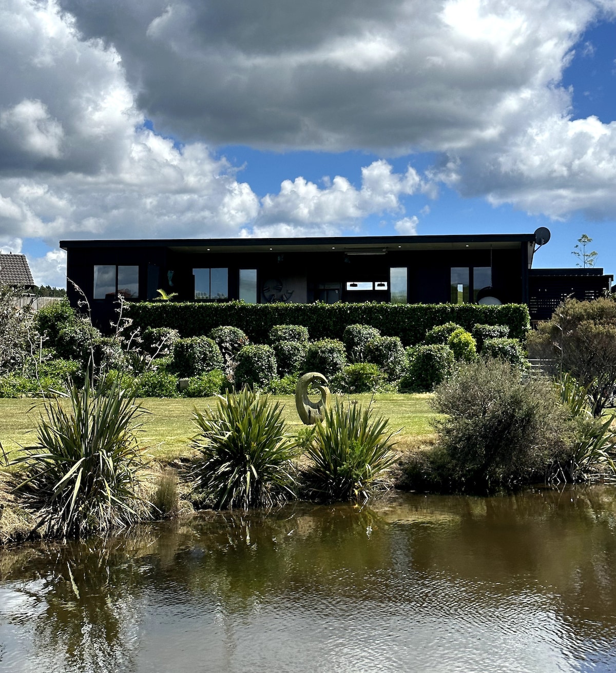 Hidden Treasure in Mangawhai Village + EV charger