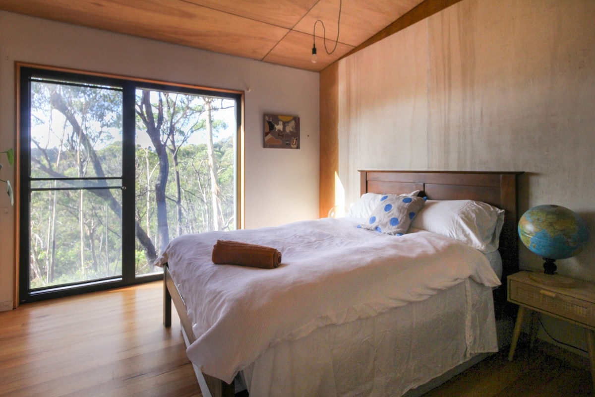 Warm and light filled home in the bush