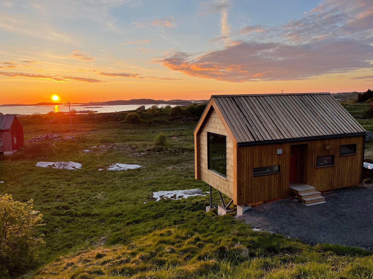 Arkitektegnet designhytte med panoramautsikt