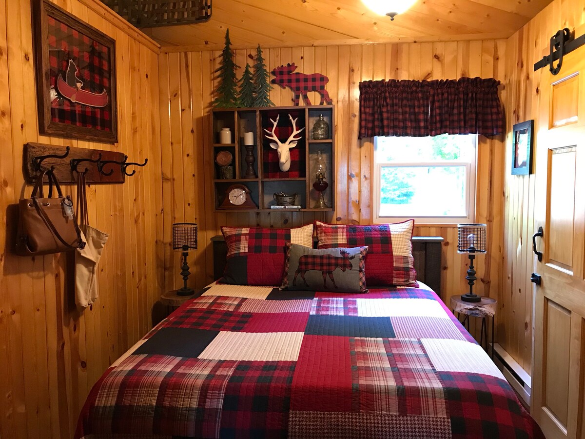 Beautiful lakeside cabin with knotty pine interior