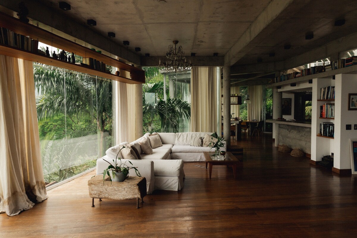 'Tree House' in the forest overlooking the sea