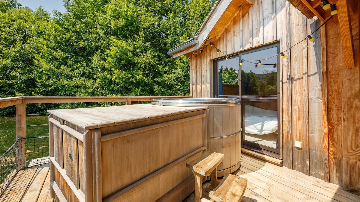 Cabane sur l'eau avec bain nordique