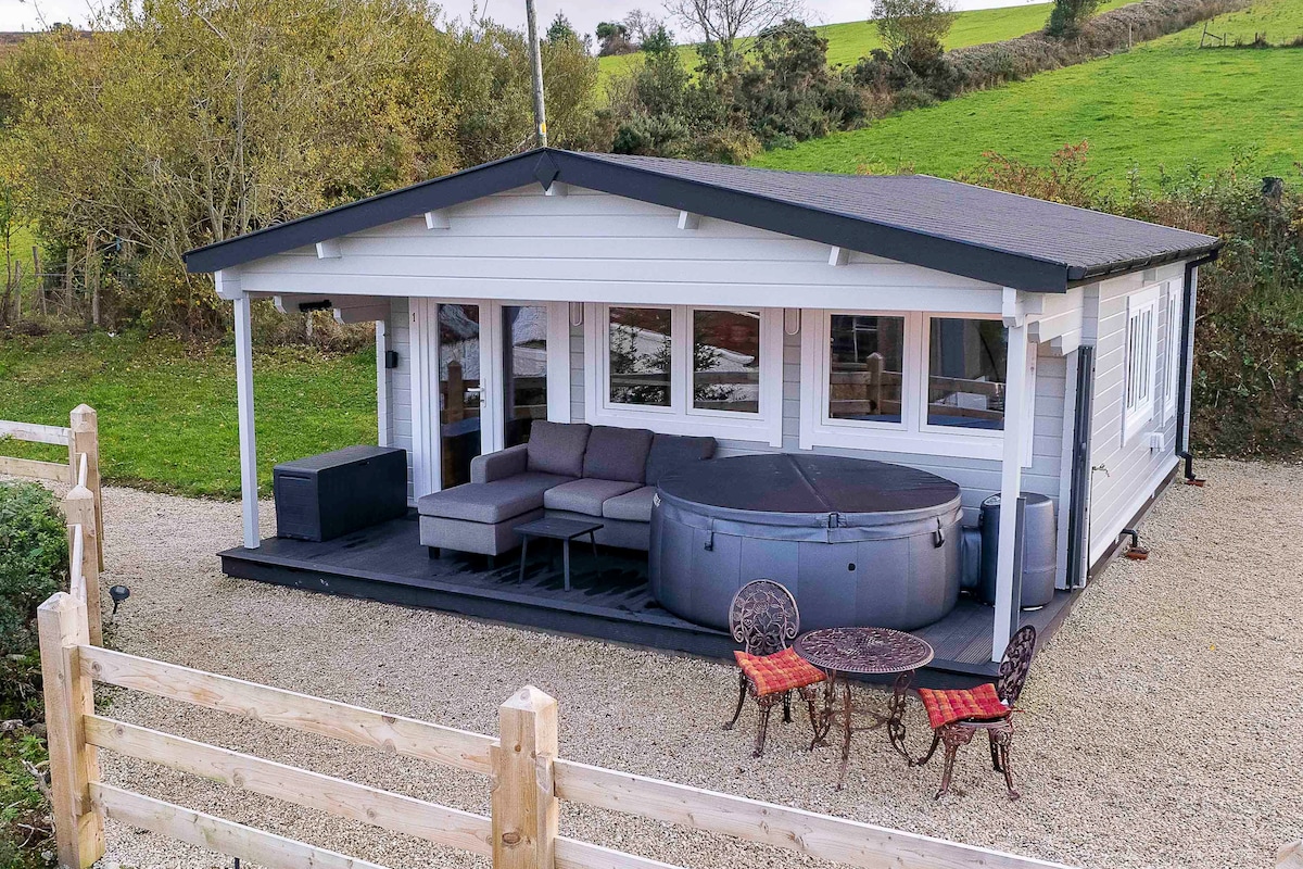 Luxury Log Cabin with Private Hot Tub & Sea Views