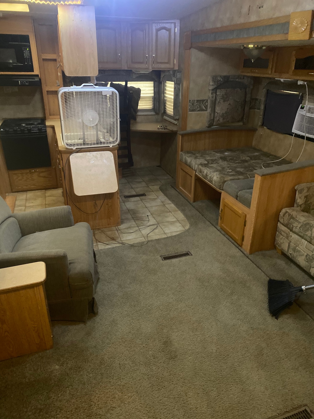 I bedroom cozy RV in country.